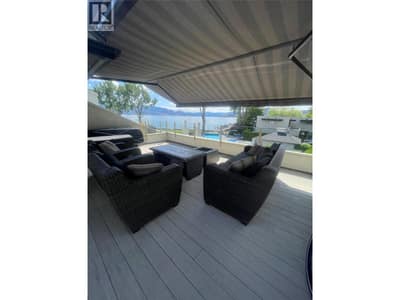 Deck with motorized awning.
