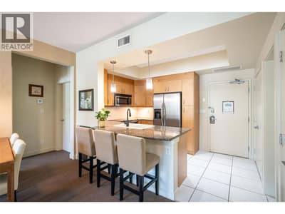 Open kichen space with eating area and granite counter top