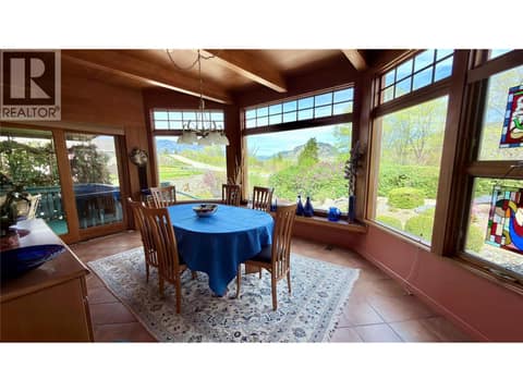 Dining area overlooking the rock/flower garden at 15230 89th Street, Osoyoos Rural