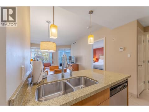 Double sink, dishwasher and generous kitchen counter space. at 15 PARK Place Unit# 209, Osoyoos