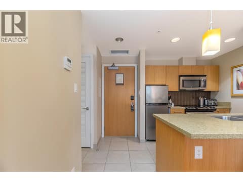 Tiled entry opening to the kitchen in Unit 209. at 15 PARK Place Unit# 209, Osoyoos