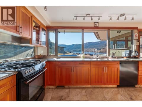 Kitchen Window View of Pool at 264 EASTSIDE Road, Eastside/Lkshr Hi/Skaha Est, Okanagan Falls