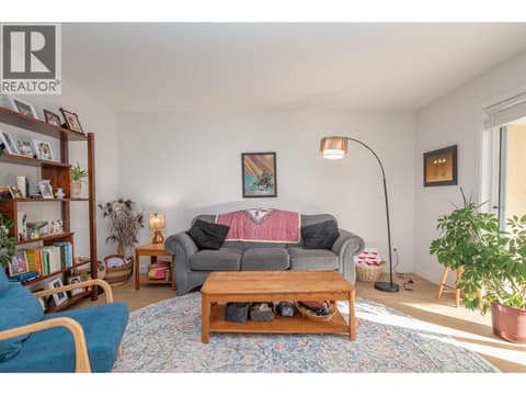 Comfortable living area with broad wall space and natural light. at 145 REDWING Place Unit# 7, Oliver