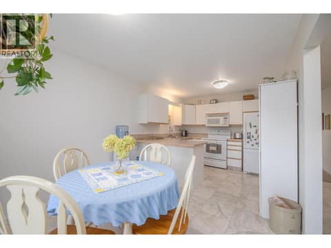 Dining area opens directly to the kitchen for an easy everyday flow. at 145 REDWING Place Unit# 7, Oliver