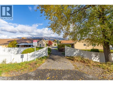 Path entrance provides context for the surrounding community setting. at 145 REDWING Place Unit# 7, Oliver