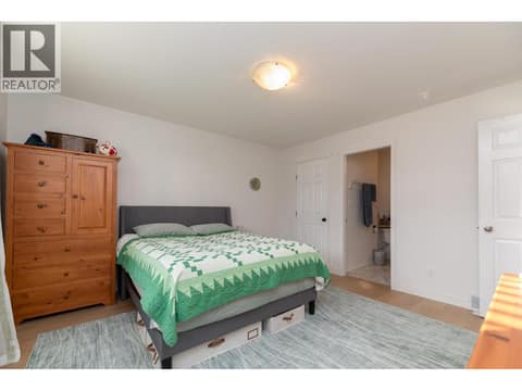 Primary bedroom view showing closet access and the adjoining doorway. at 145 REDWING Place Unit# 7, Oliver