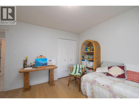 Reverse view of the second bedroom showing its closet and open floor area. at 145 REDWING Place Unit# 7, Oliver
